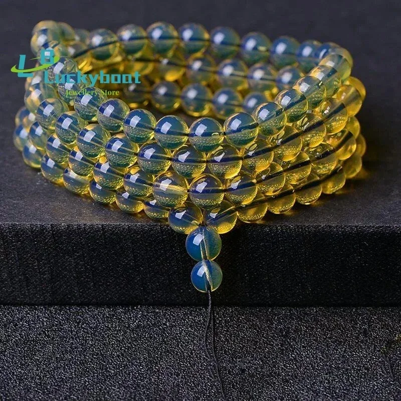 Фото Браслет из мексиканского синего янтаря Koraba Fine Jewelry с 108 бусинами из воскового янтаря, для мужчин и женщин №1