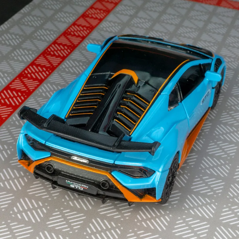 Фото Модель автомобиля Lamborghini STO от Rastar в масштабе 1:32, из сплава, с открывающимися дверями и капотом, с имитацией звука и света. №4