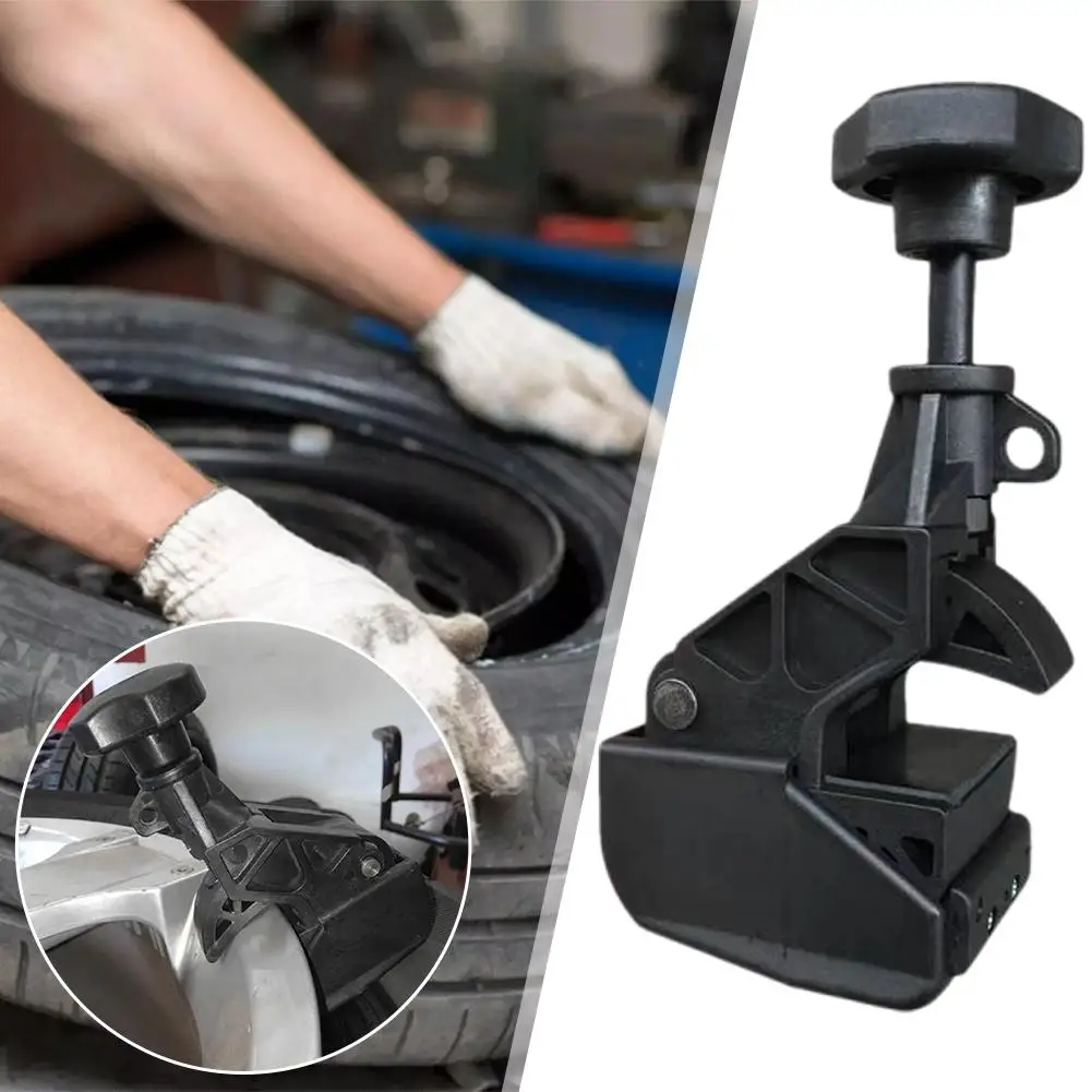 Универсальный вспомогательный инструмент для смены колесного диска снижение