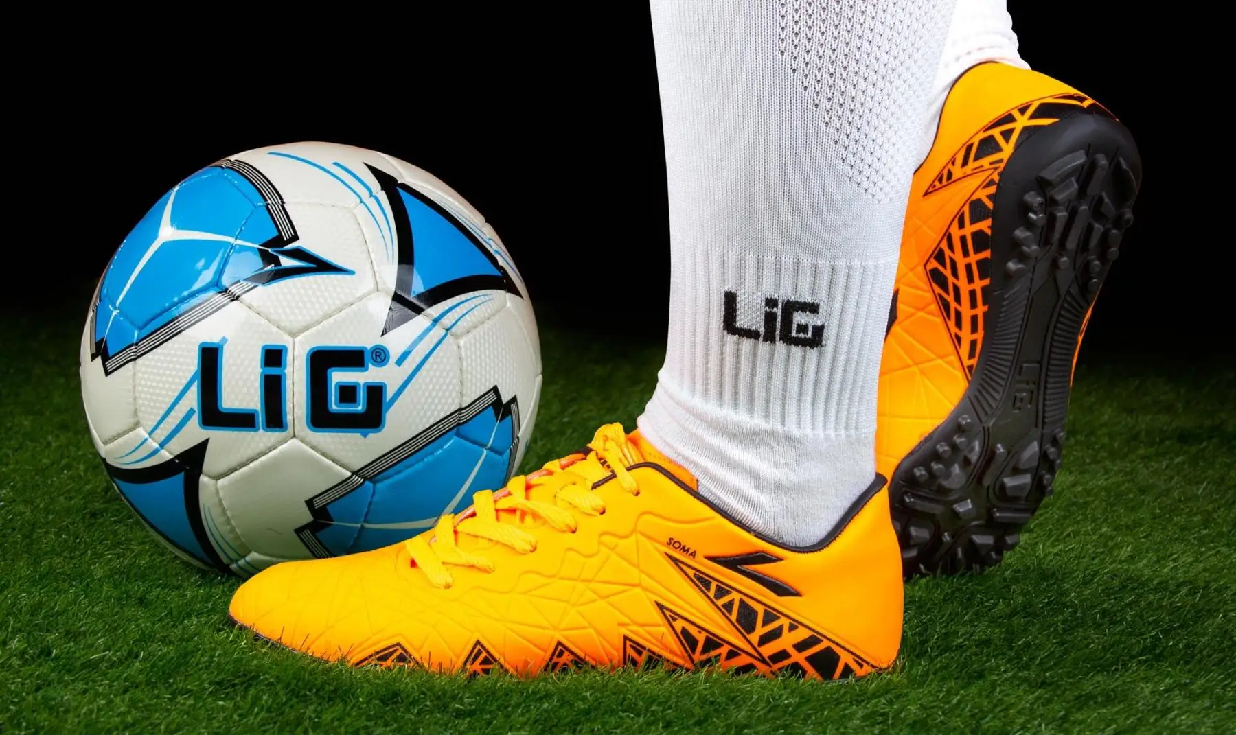 Футбольные бутсы LIG SOMA TRX TURF FL. Оранжевые |