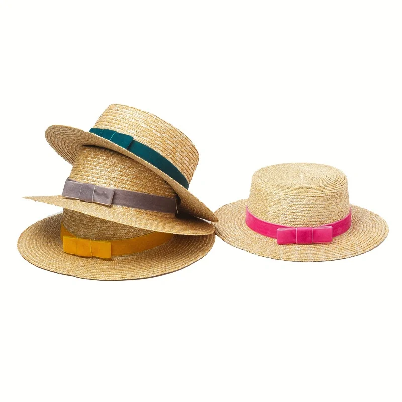 

Straw hat with velvet ribbon and flat top