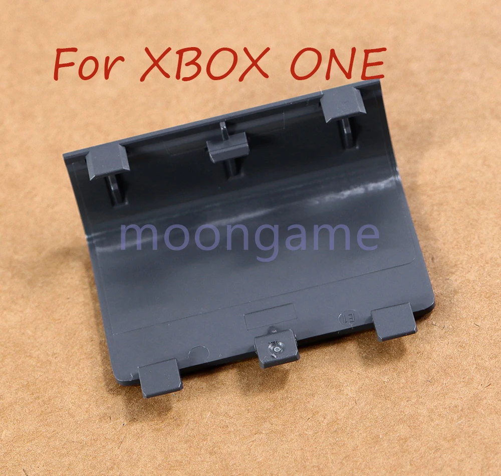 Фото 1 шт. оригинальная новая черная крышка батарейного отсека для XBOXONE, задняя панель для замены контроллера XBOX ONE №1