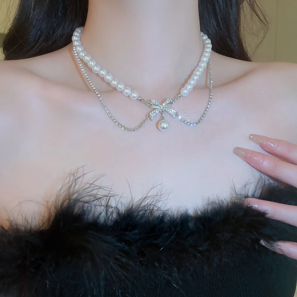 

2023 New Korean Fashion Double Layer Pearl Rhinestone Chain Shiny Bow Pendant Ladies Charm Necklace Wedding Party Jewelry