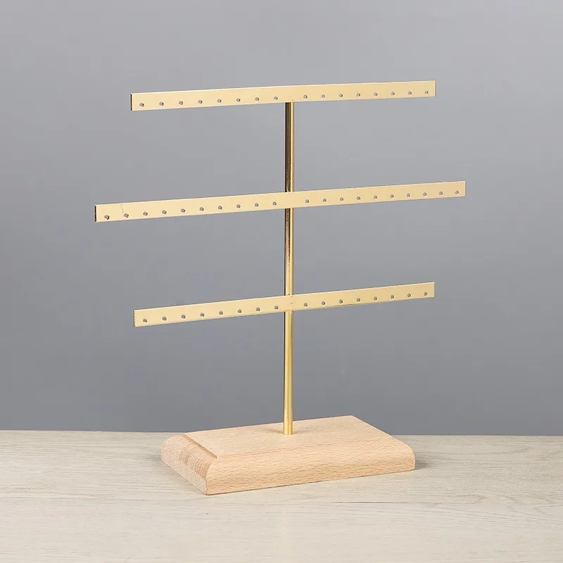 

Металлическая подставка для сережек 52 отверстия