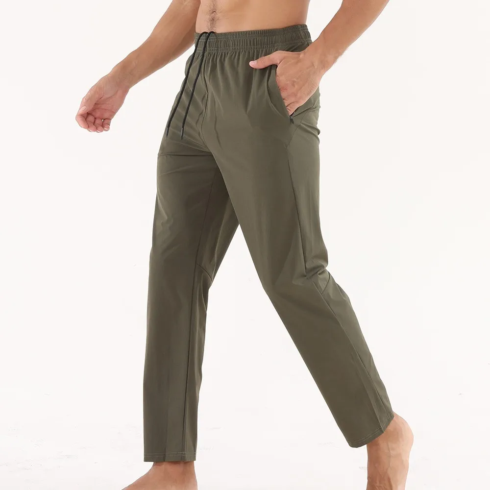 Мужские брюки спортивные штаны дышащие весенние с эластичной резинкой на талии