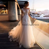 sheer o neck lace appliques wedding dresses for women 2022 cap sleeve tulle a line bride gown vestido de novia %d1%81%d0%b2%d0%b0%d0%b4%d0%b5%d0%b1%d0%bd%d0%be%d0%b5
