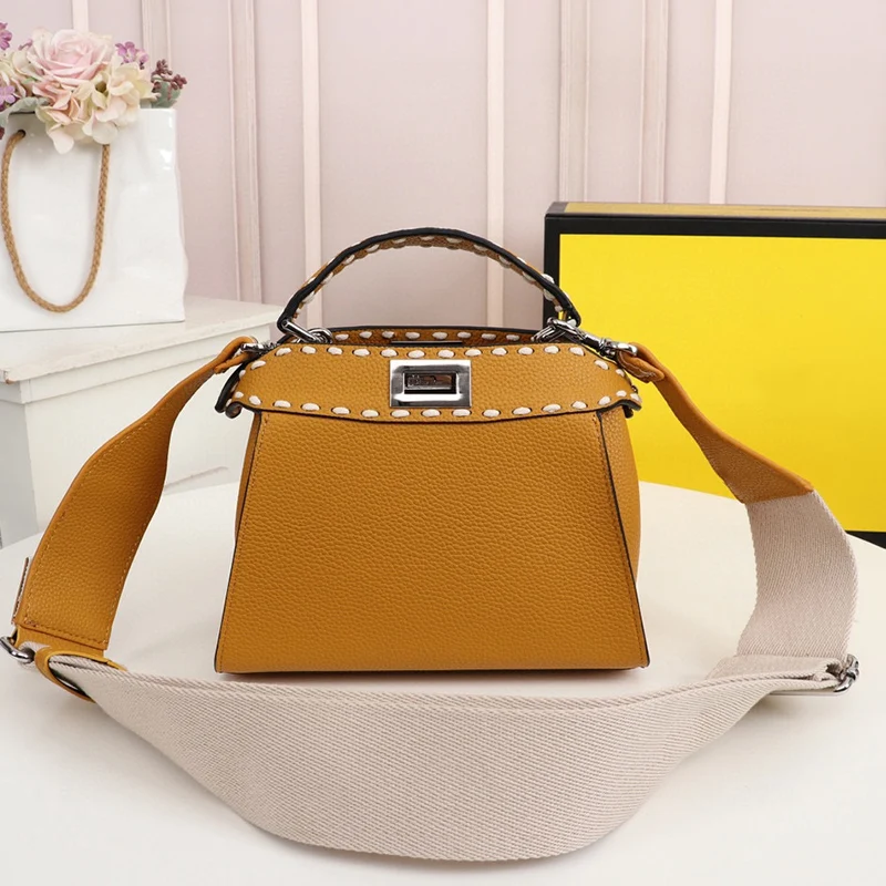 

Fashion handbags hand-stitched leather handbags simple solid color shoulder bag large capacity Joker leisure messenger bag.