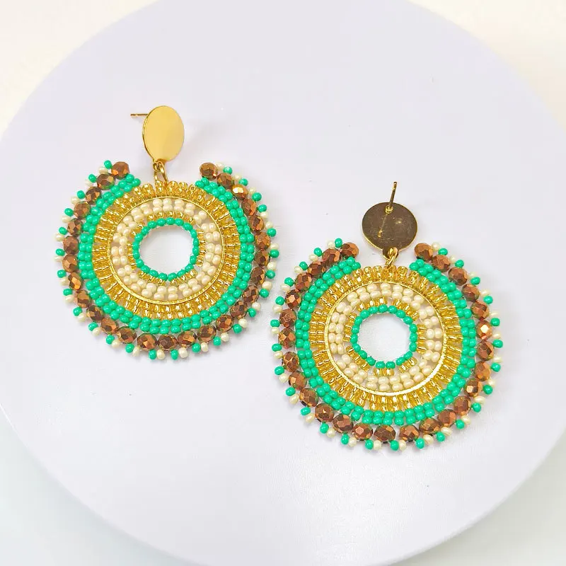 Серьги бусины в виде риса круглой формы с вырезами оригинальные ручные вязаные