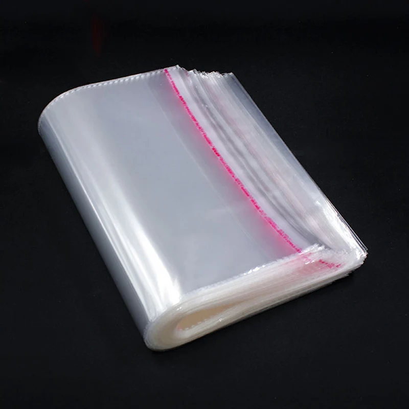 

100pcs Transparent Gift Bags DIY Candy Biscuit Cookie Packing Bags Self Adhesive Plastic Cellophane Food Bag Kitchen Organizer