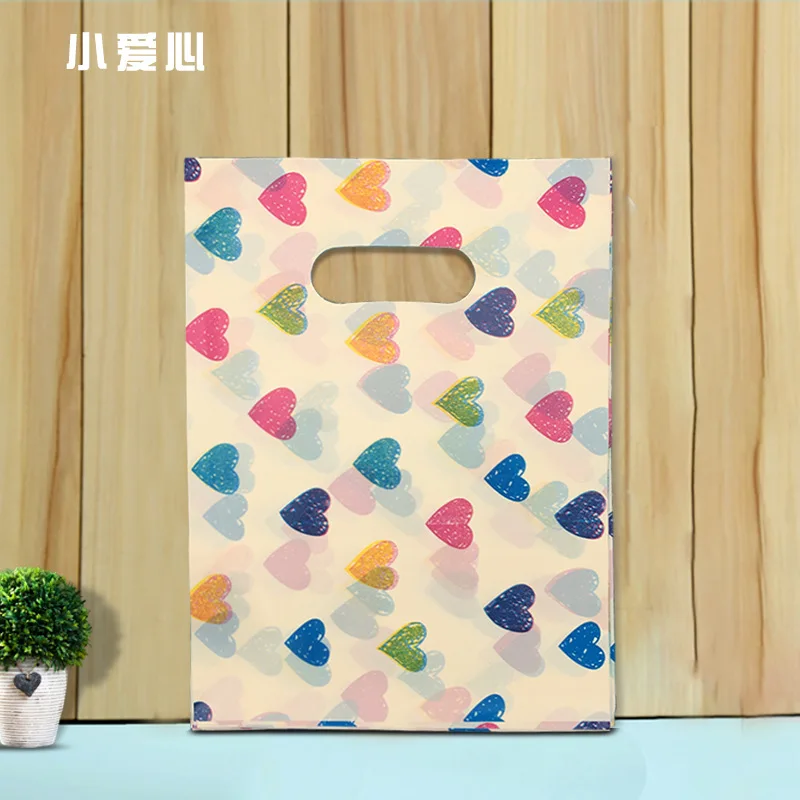 

Цветные пластиковые подарочные пакеты 50 шт.