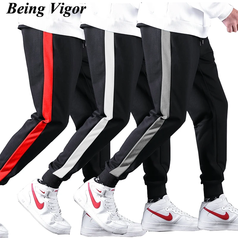 Брюки мужские в полоску джоггеры повседневные штаны эластичные спортивные под