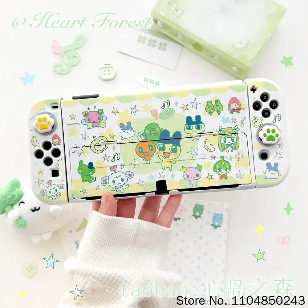 Фото Оригинальный защитный жесткий чехол Tamagotchi Switch с дизайном в виде зеленого яблока и мультяшного лесного пейзажа для игровых консолей Switch Oled Lite №4
