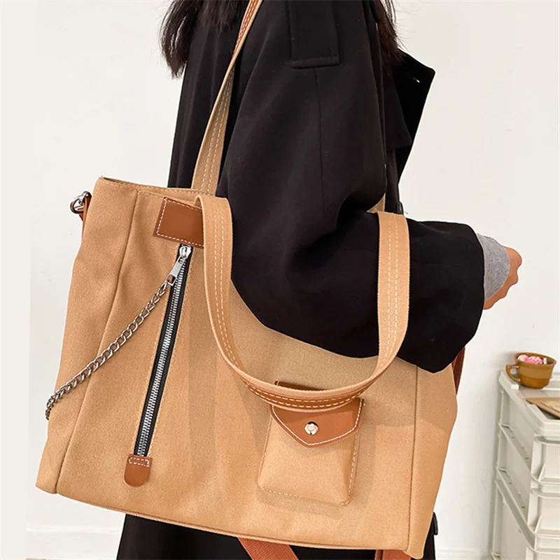 

Холщовая женская сумка-мессенджер с множеством карманов