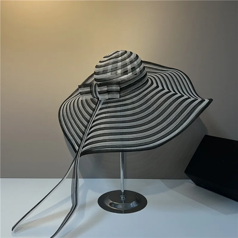 

202203-YY summer holiday beach transparent yarn stripe bowknot model wide brim shade lady sun cap women leisure hat