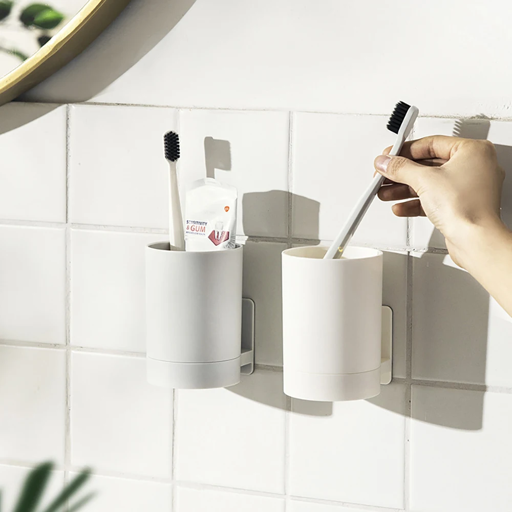 Simple wall mounted toothbrush holder Toothpaste cup holder Drilling free bathroom storage rack Portable storage rack Brand new