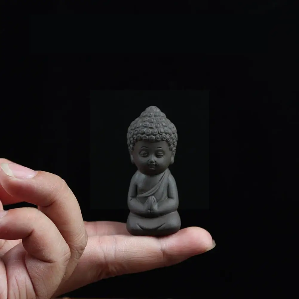 Рисунок 2 - Креативные статуи Будды из чёрной керамики дзен