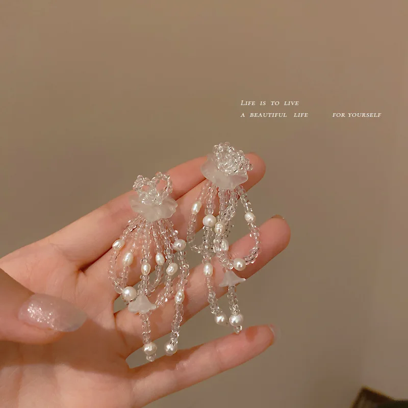 

925 Silver Needle Rice Pearl Flower Earrings Korean Super Fairy Bow Transparent Sweet Long (female)