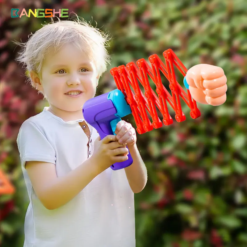 

2023 Retractable Fist Gun Elastic Gun Children's Toy Funny Magic Gun Toy Gun Boy Baby Educational Toy Wholesale