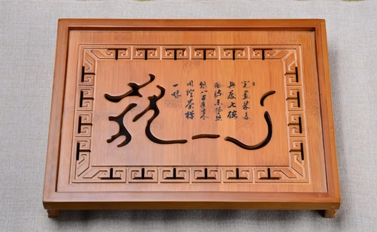 

Hot Sale Flower Carving Kung Fu Tea Set Natural Wood Bamboo Tea Tray Rectangular Traditional Bamboo Puer Tea Tray Tea Table