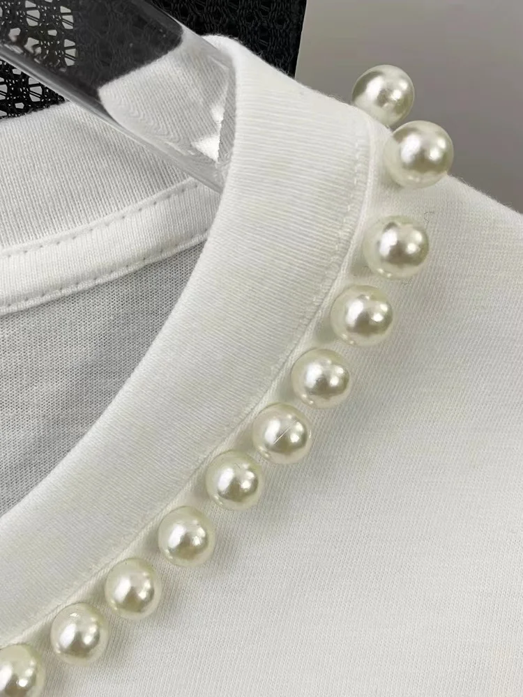 Женская свободная футболка с бусинами