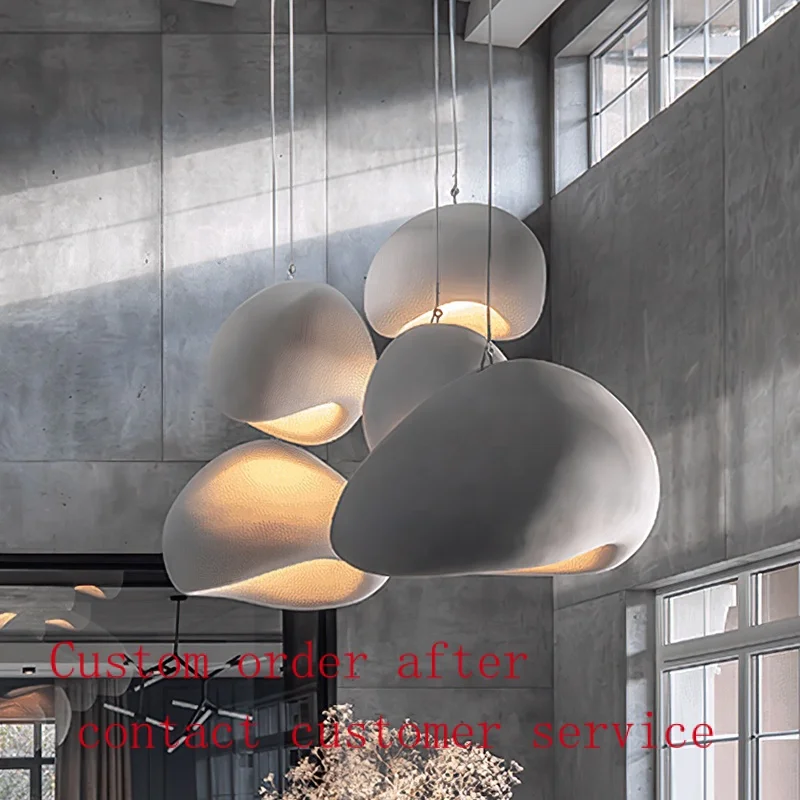 

Japanese wabi sabi style modern retro loft restaurant bar and clothing shop decorated with chandeliers