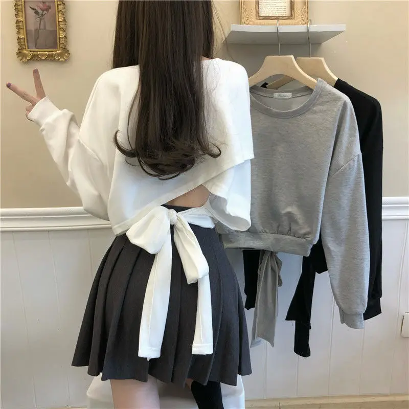 2023 New Women's Short Hollow Backless Strap with Bow Design Sense Thin Long Sleeve Top