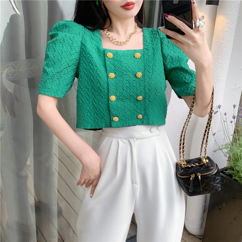 Make the net price of French small collar short jacket summer han edition female embossing hubble-bubble sleeve shirt double-bre |