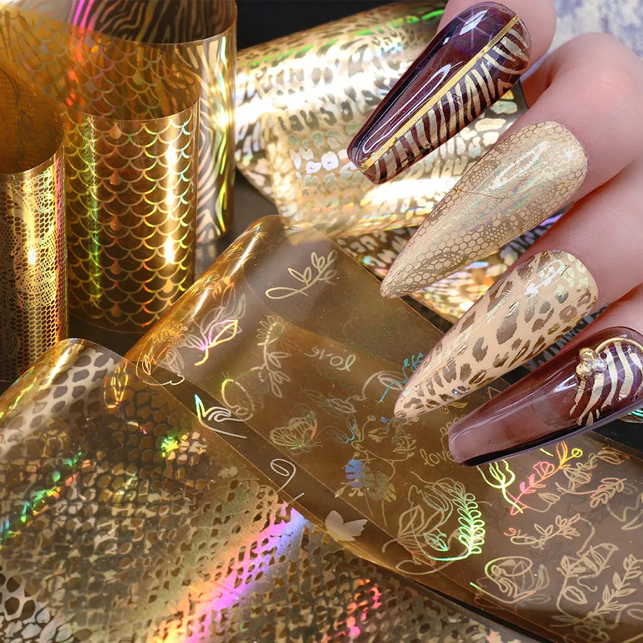 

16pcs Laser Gold Nail Foils Holographic Nail Stickers Leopard Fish Scales Heart Geometry Abstract Face Nail Design SA16JS20