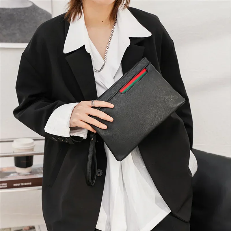 

Fashion handbag casual wrist bag men's bag new youth simple versatile men women solid handbags clutch bag luxury brand bag 2023