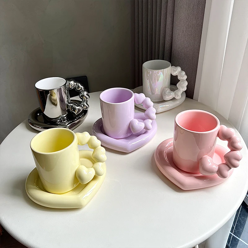 

Creative Heart Coffee Cup With Heart Shape Saucer Yellow Pink Purple Silver Pearl White Ceramic Tea Cup Set Cute Birthday Gifts