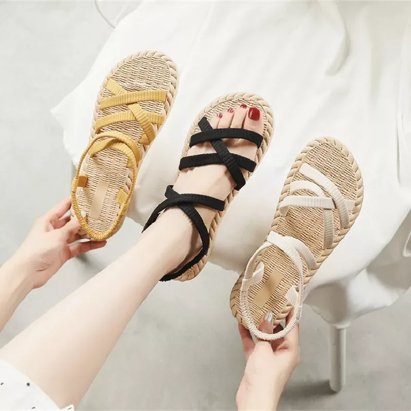 

sandals outside Korea tide female imitation hemp straw tourism bottom wear flat beach flat with cool fashion slippers