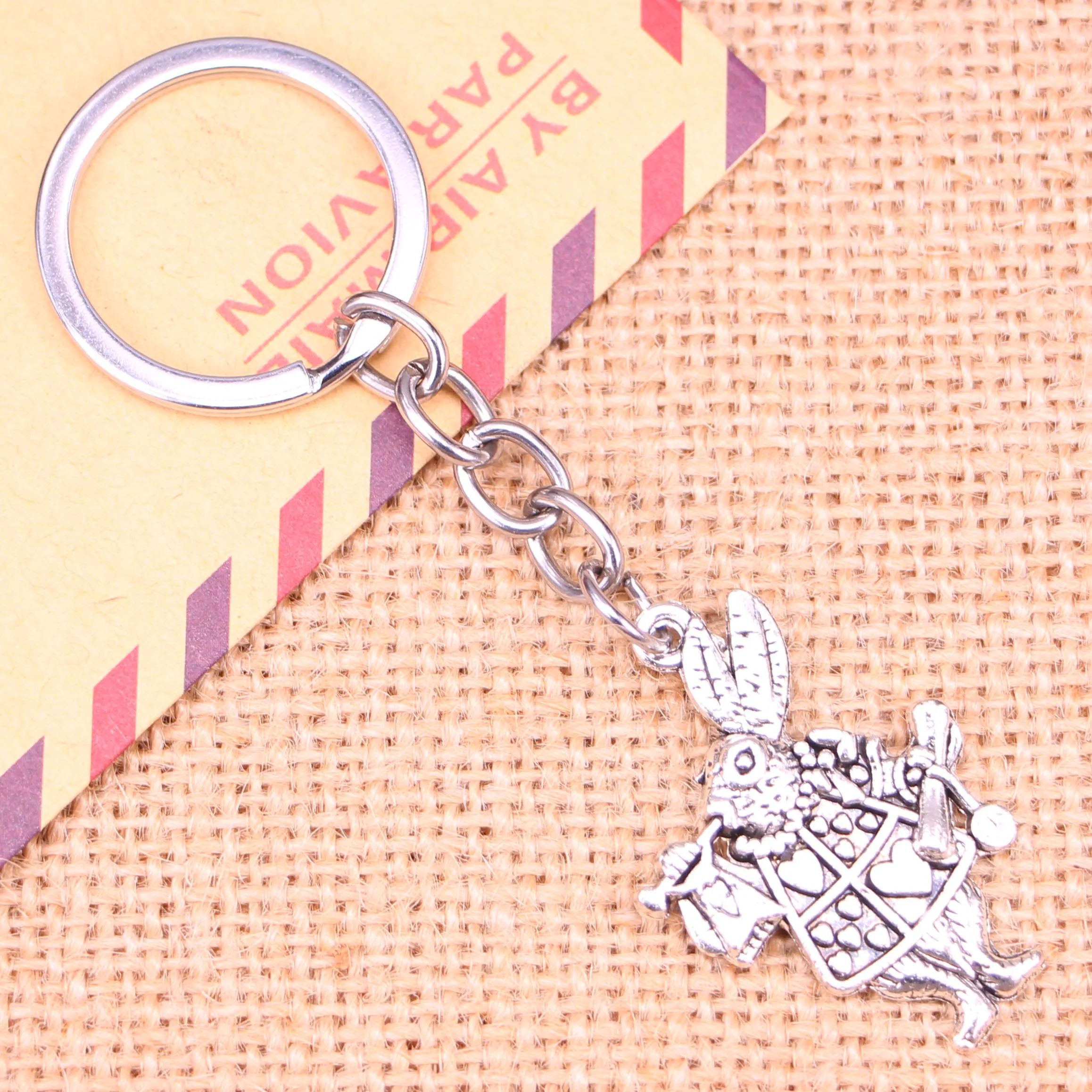 

20pcs New Fashion Keychain 36*23 mm musical rabbit trumpet Pendants DIY Men Jewelry Car Key Chain Ring Holder Souvenir For Gift