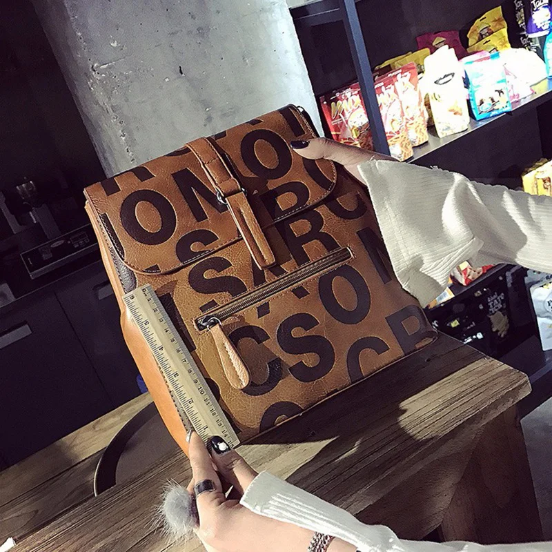 

YILIAN Soft leather pressed letter backpack 2022 new fashion trend large capacity travel bag versatile student backpack