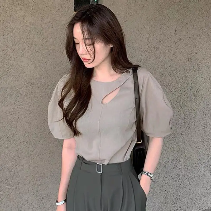

South korea Chic Summer Elegant Simple round Neck Hollow Button Design Loose All-Match Puff sleeve Shirts Top Women