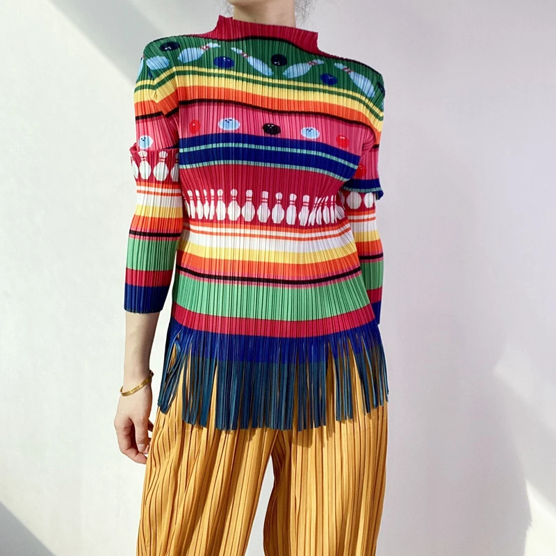 

Woman graphic Printed t-shirts Miyake Pleated Fashion Tassel design Batwing Sleeve Long-sleeved Stand collar Female Tops Tide
