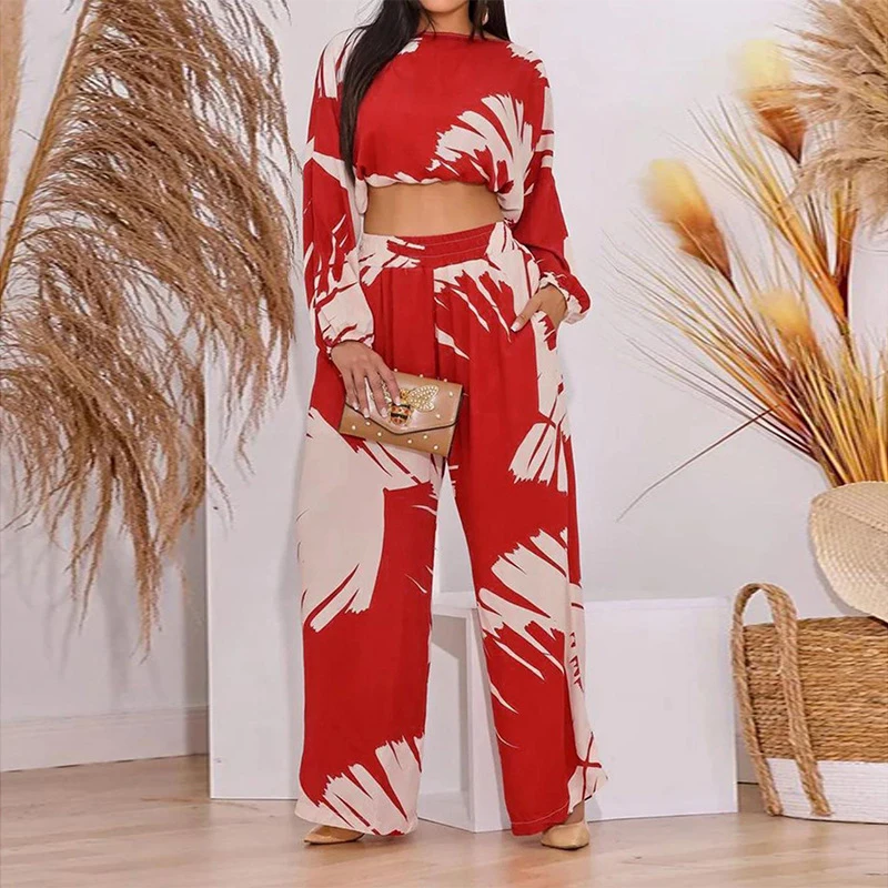 

Женский Повседневный костюм с принтом, осенний костюм из двух предметов, короткий топ с длинным рукавом и круглым вырезом и брюки с широкими...