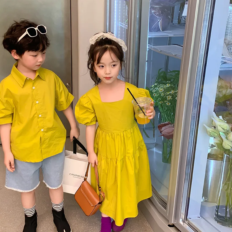 

Kids Summer solid color holiday clothes Siblings cotton clothings boys short sleeve shirts girls Bare waist puff sleeve dress