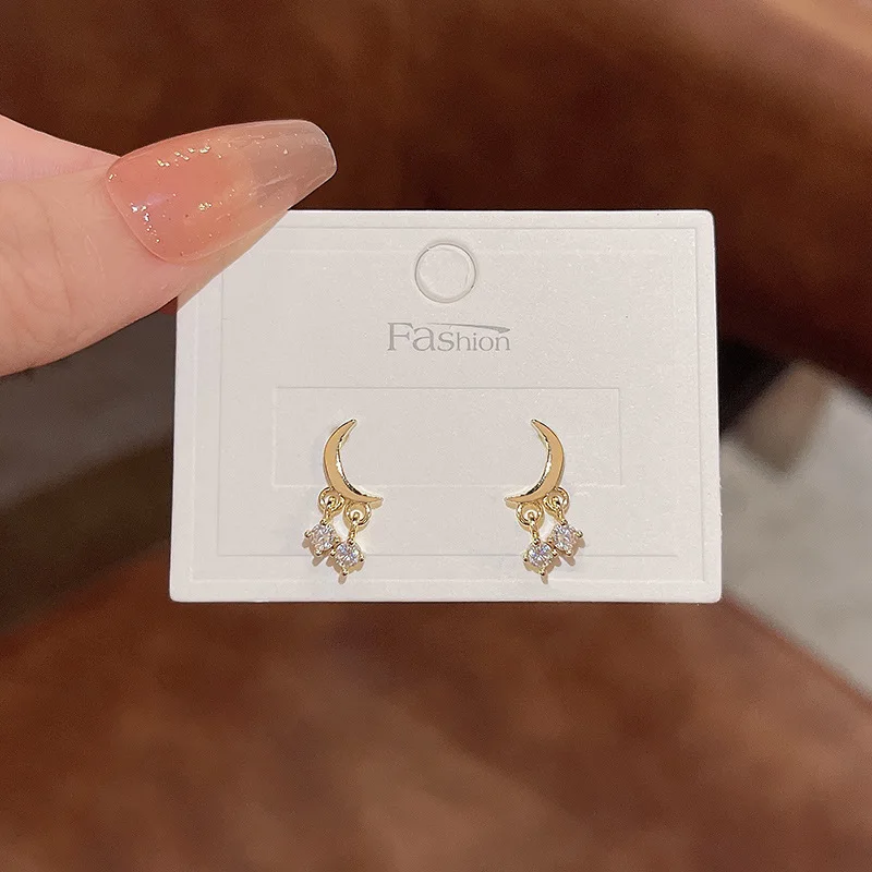 

Fashion New Simple Temperament Star Moon Earrings Female Ins Tide Forest Series All-match Temperament Zircon Pendant Earrings