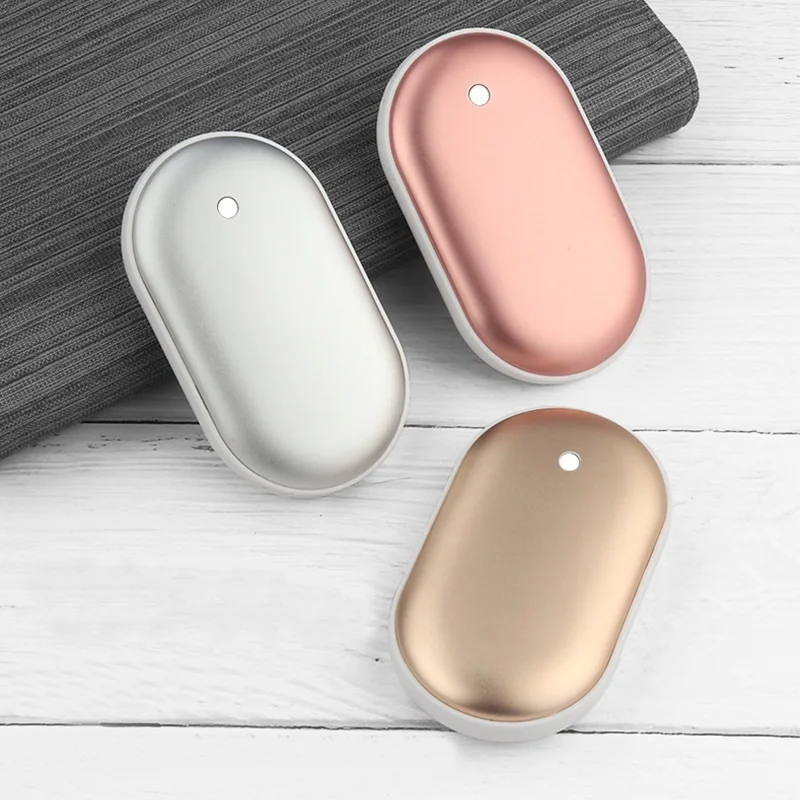 

Factory direct two-in-one fever mobile Powerbank mini pebble warm hand treasure charging electric treasure