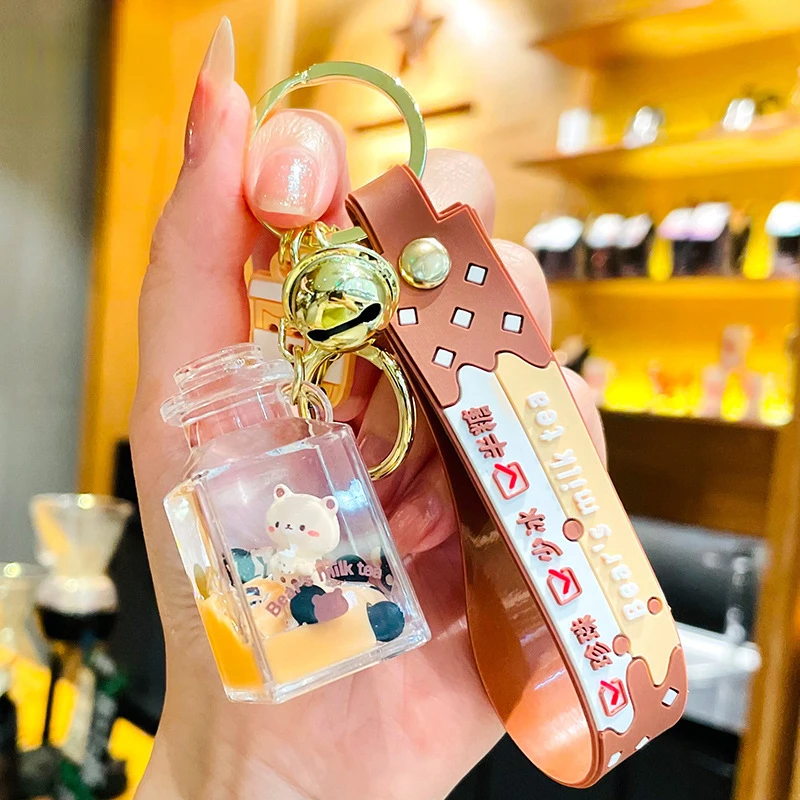 

Creative Cartoon Bear Key Chain with Nail Clippers Milk Tea Cup Oil Floating Car Keychain Schoolbag Small Pendant For Gift
