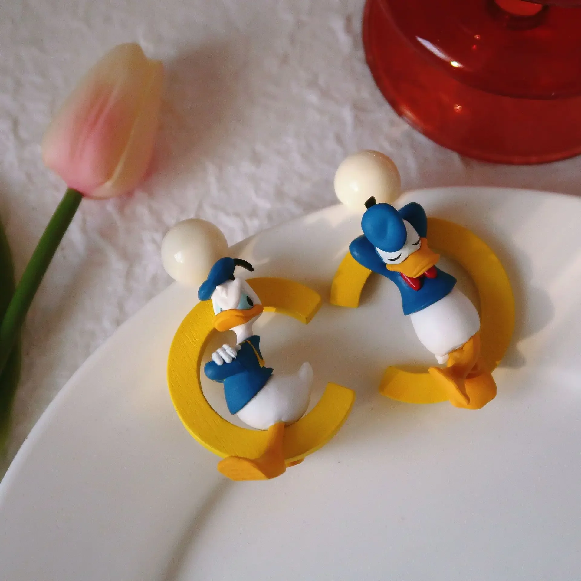 Серьги-гвоздики MINISO с Дональдом Даком