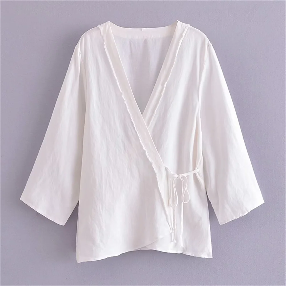 

Женская блузка с V-образным вырезом и длинным рукавом