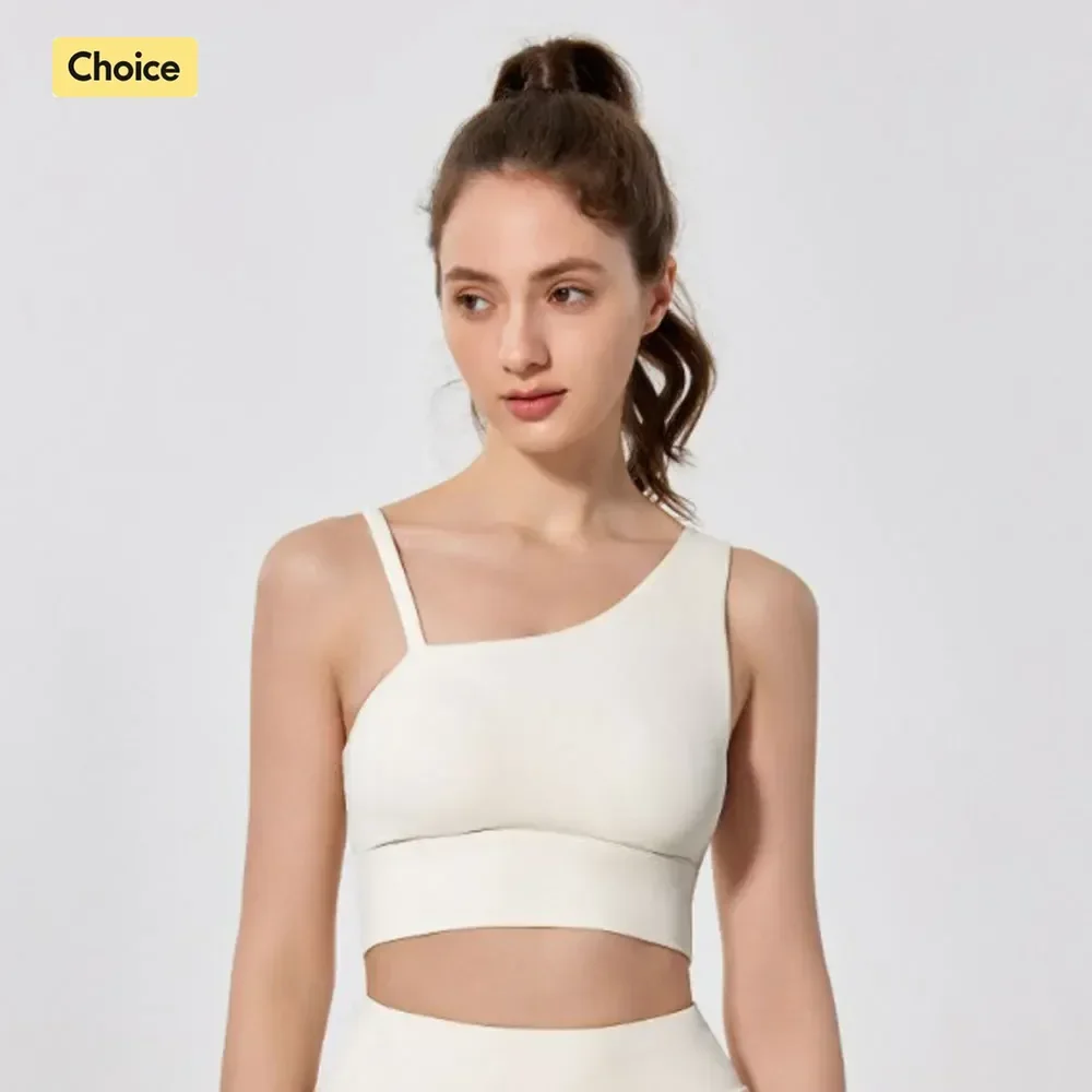 Спортивный бюстгальтер с асимметричными бретельками телесного цвета