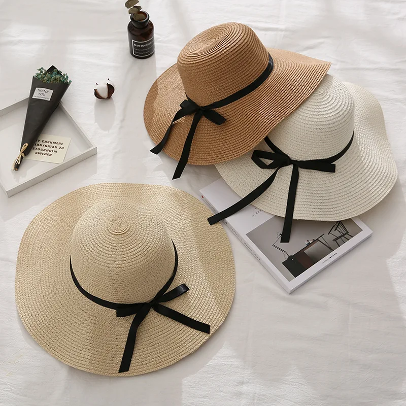 

Summer new seaside big-brimmed ladies straw hat Korean version travel vacation foldable bow dome straw hat