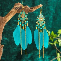 new ethnic flower shaped long feather earrings for women boho retro chain rice bead tassel earrings trendy vacation jewelry gift