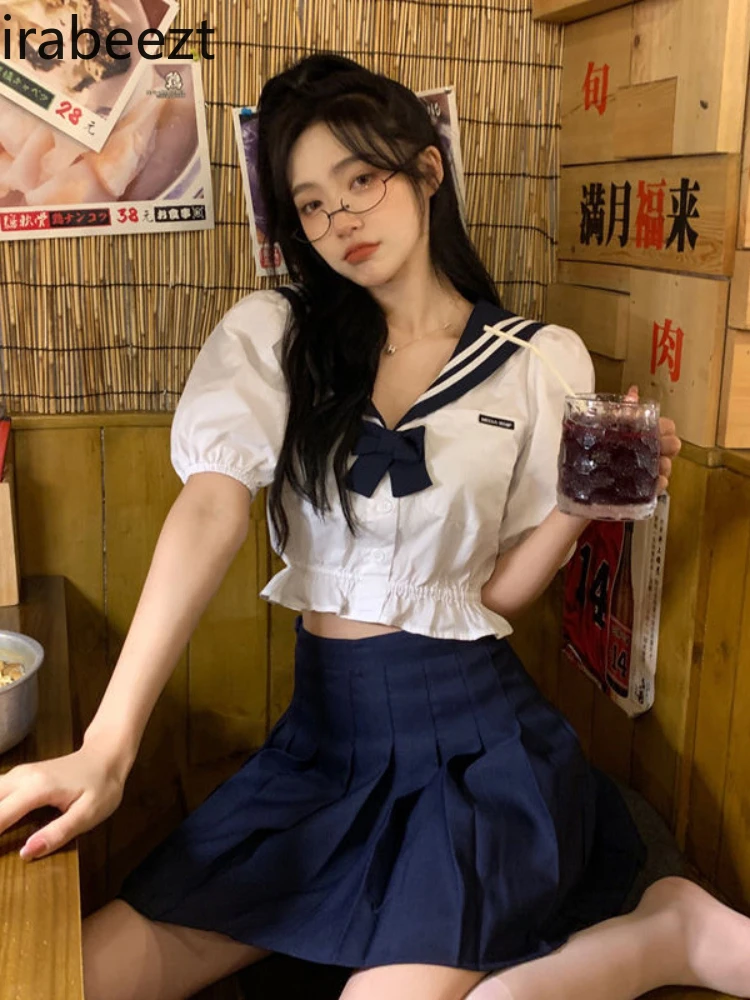 Irabeezt Jk-trajes de uniforme para mujer, Tops de manga abullonada con cuello azul marino coreano + Falda plisada de cintura alta, tendencia de dos piezas, verano 2022