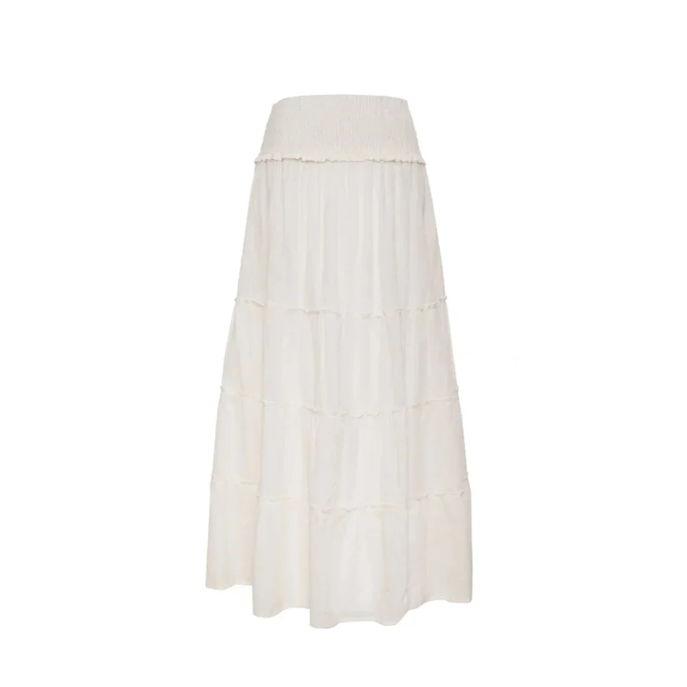 Женская белая юбка макси с оборками и поясом