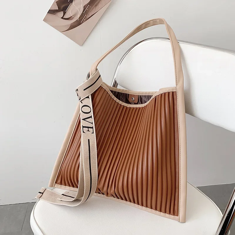 

2023 New Bag Hot Selling Women's Versatile Pleated Large Capacity Tote Bag Fashion One Shoulder Design Bucket Bag Women