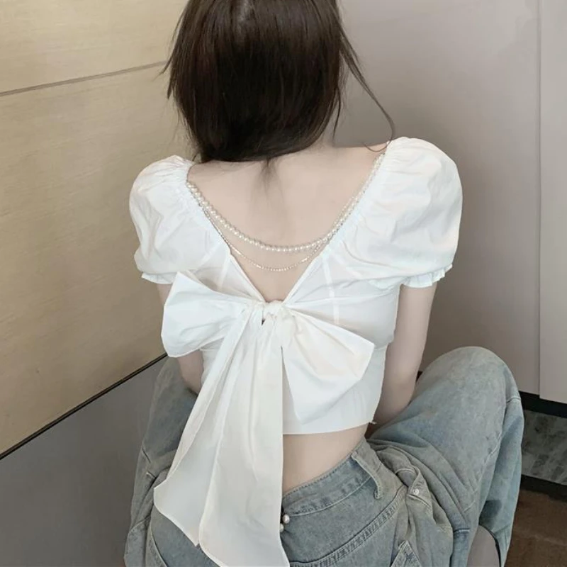 

Summer Women 3D Bowtie Knot Backless Lace Up Shirts Pleated Slach Neck Blouses White Pearls Pendant Puff Sleeve Crop Tops Blusa