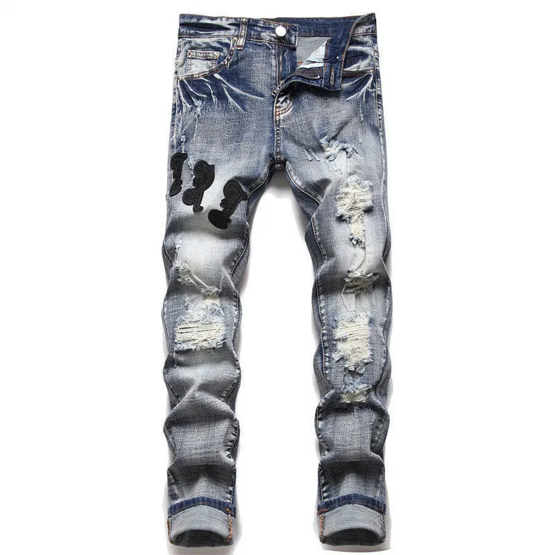 Pantalones vaqueros rasgados De marca para hombre, Jeans De cuero con letras De retales, ajustados rasgados para motocicleta, con agujeros, color azul, marca De lujo